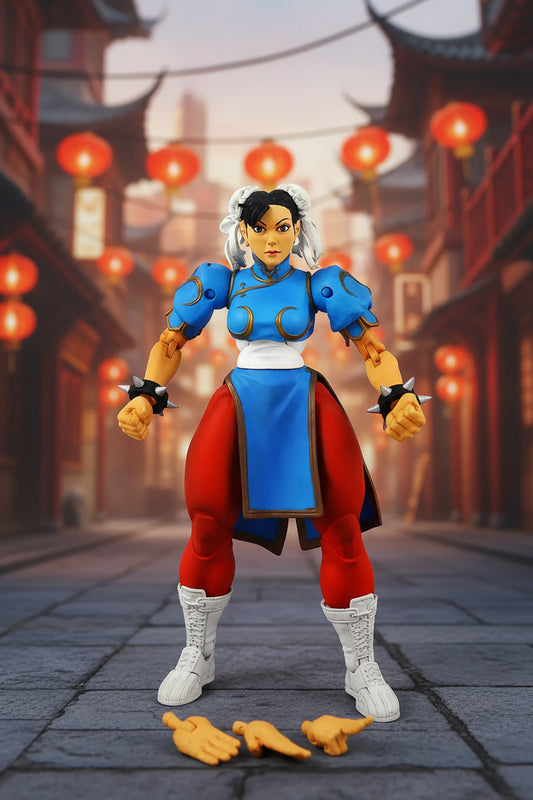 A Street Fighter action figure of Chun-Li standing on a white background, with three interchangeable hands placed in front of her.