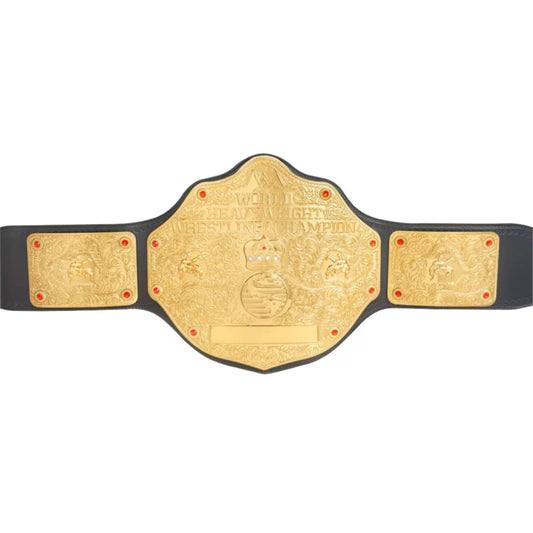 A championship wrestling belt with a large gold central plate and two matching gold side plates on a black strap, shown against a plain white background.